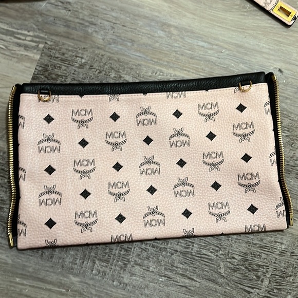 MCM large backpacks with detachable front pockets and use as crossbody bags.. - Picture 9 of 12